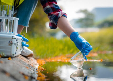 scientist-collecting-water-sample scientist-collecting-water-sample